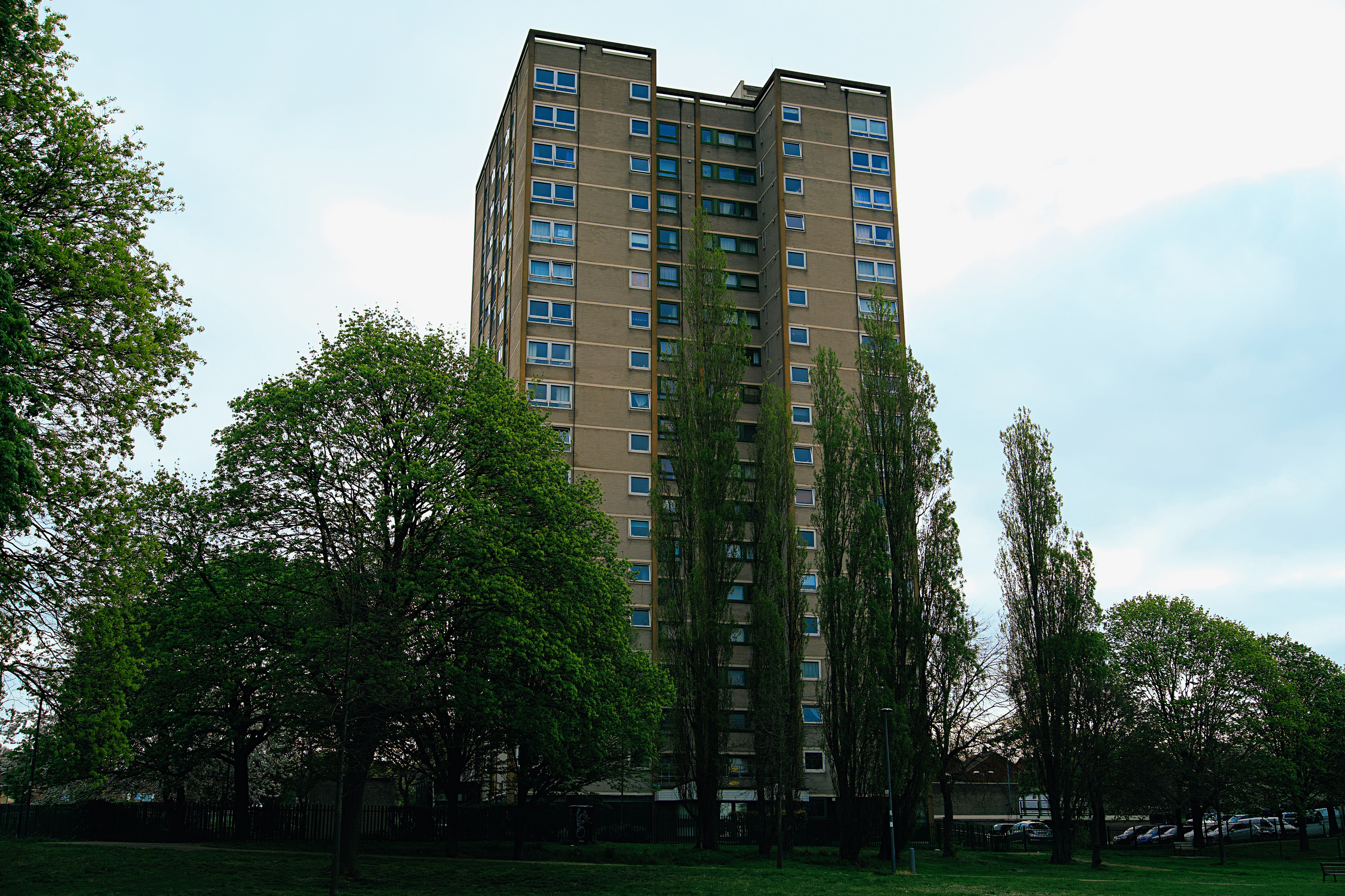 Tower Block of Flats Surrounded by Trees